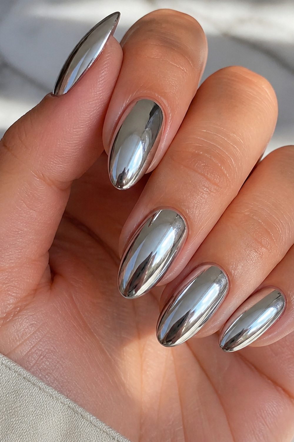 Chrome silver almond nails